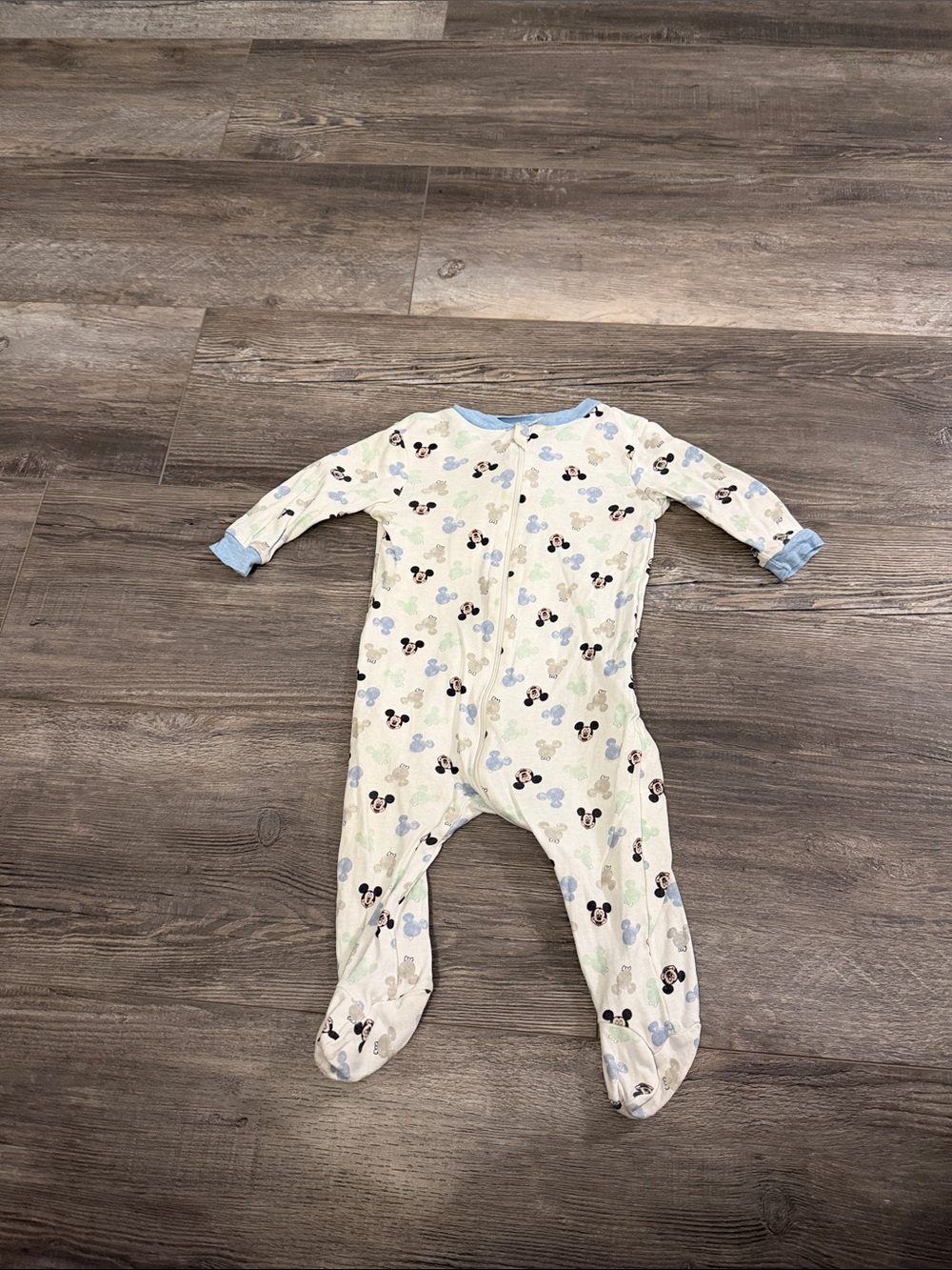 Disney Baby One-Piece Footed Sleeper in White with Blue Trim